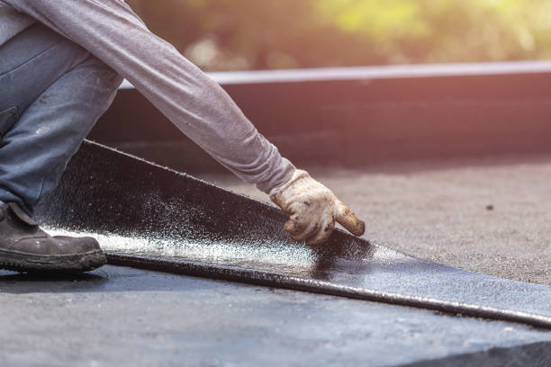 Professional Waterproofing technician working in East Northport, NY
